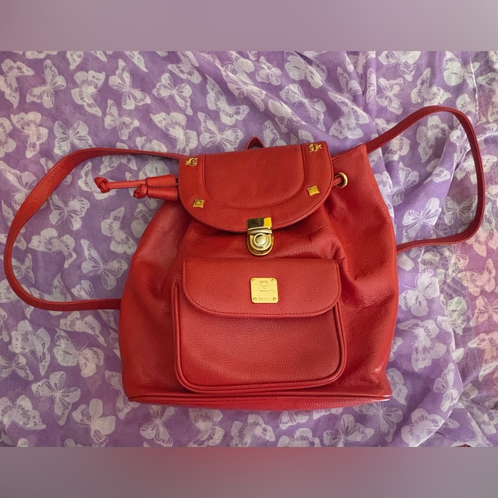 Red MCM Leather Backpack and coordinating wallet